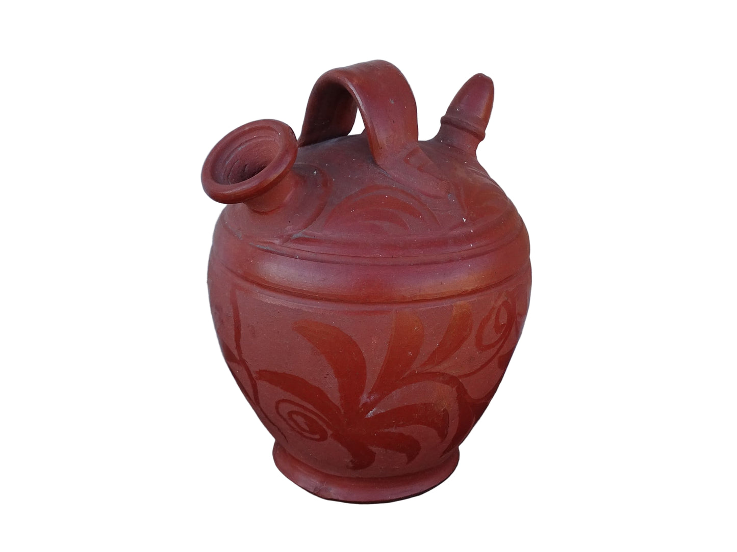 French vintage ceramic gargoulette in a deep red colour with floral detailing. The body of this terracotta jug is a rounded shape with a handle to the top and two spouts.