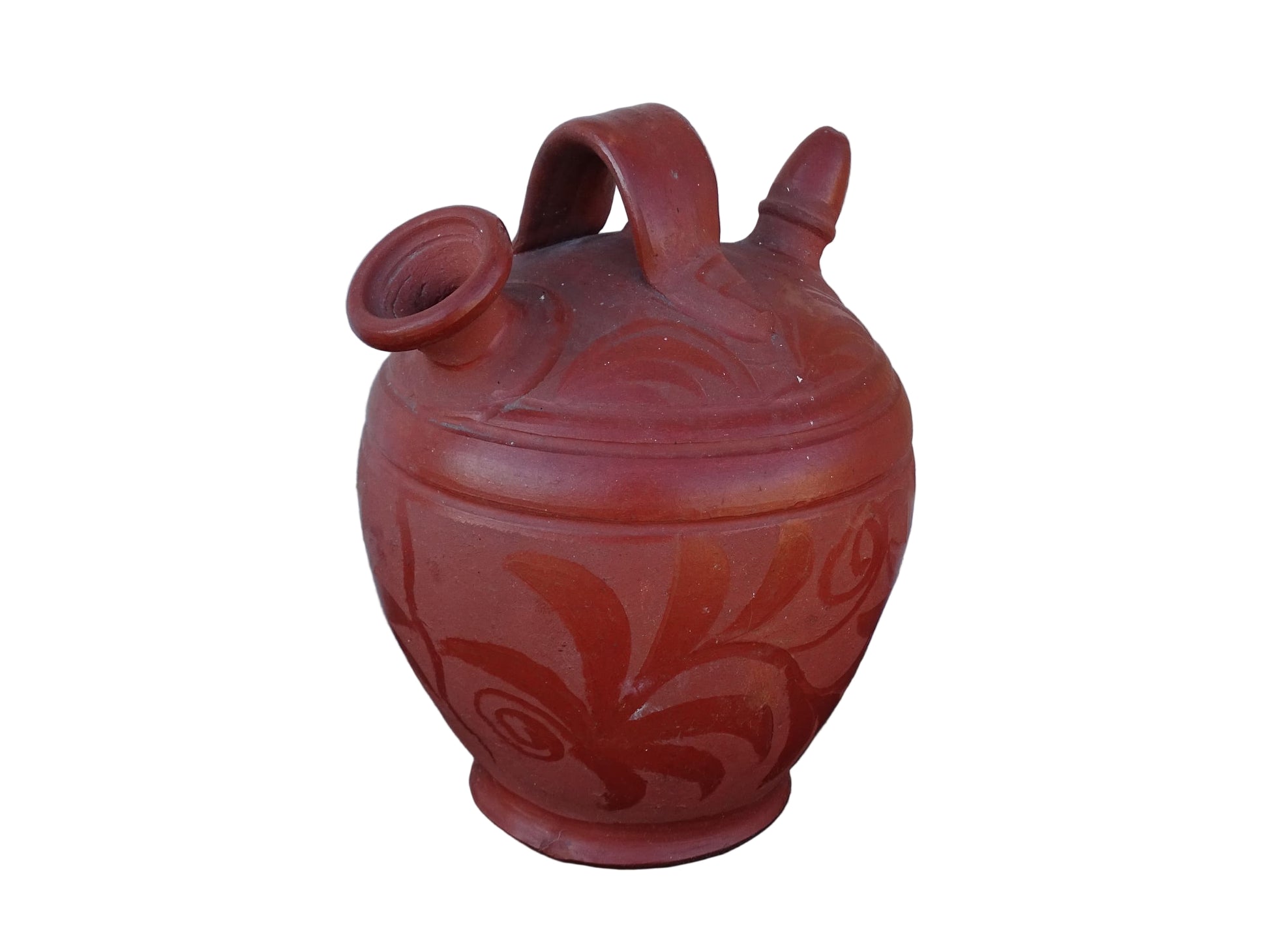 French vintage ceramic gargoulette in a deep red colour with floral detailing. The body of this terracotta jug is a rounded shape with a handle to the top and two spouts.