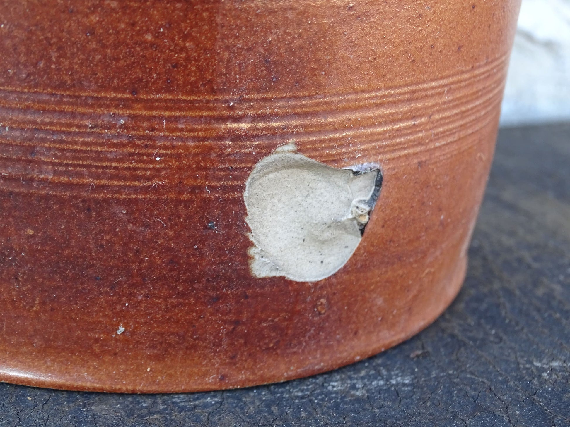 Small French antique pottery confit jar with a brown salt glaze. Rustic stoneware pot.