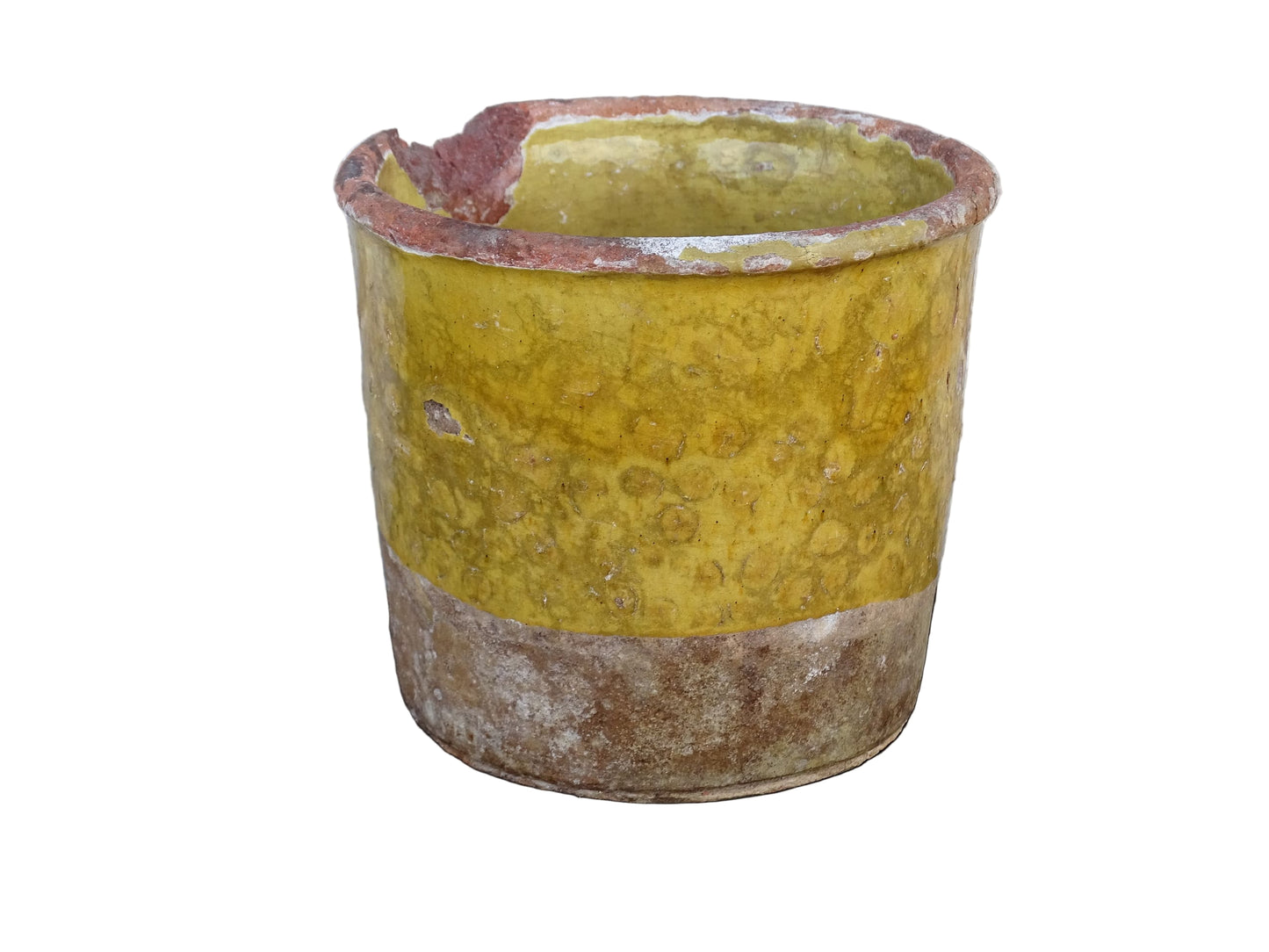 French antique yellow confit pot with patina. Aged earthenware pot with glaze.