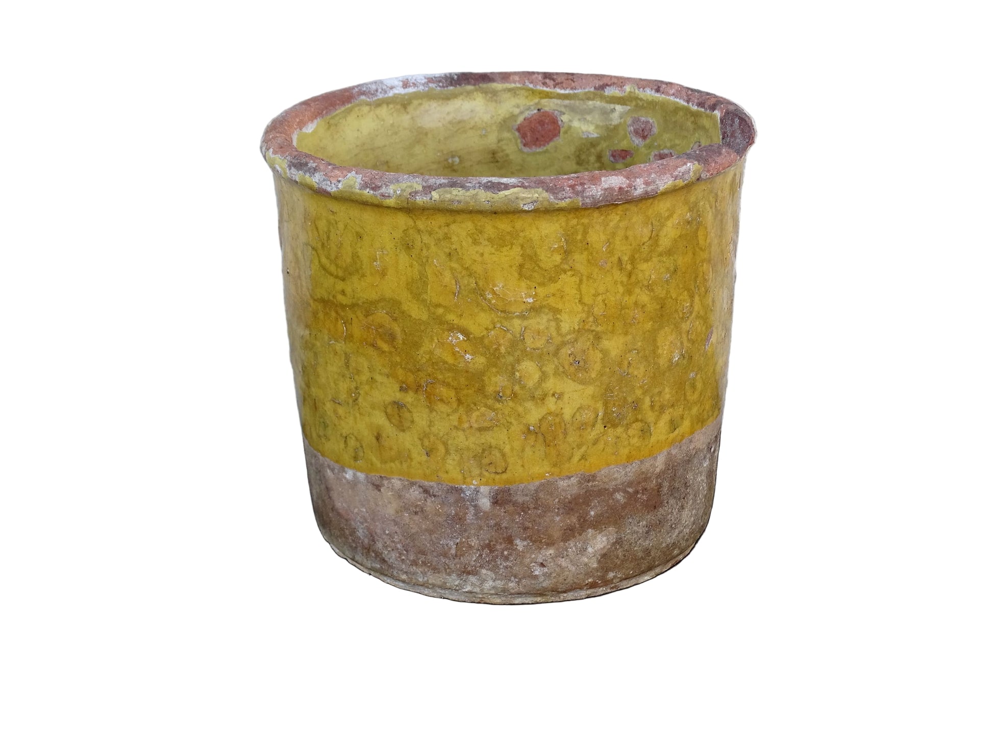 French antique yellow confit pot with patina. Aged earthenware pot with glaze.