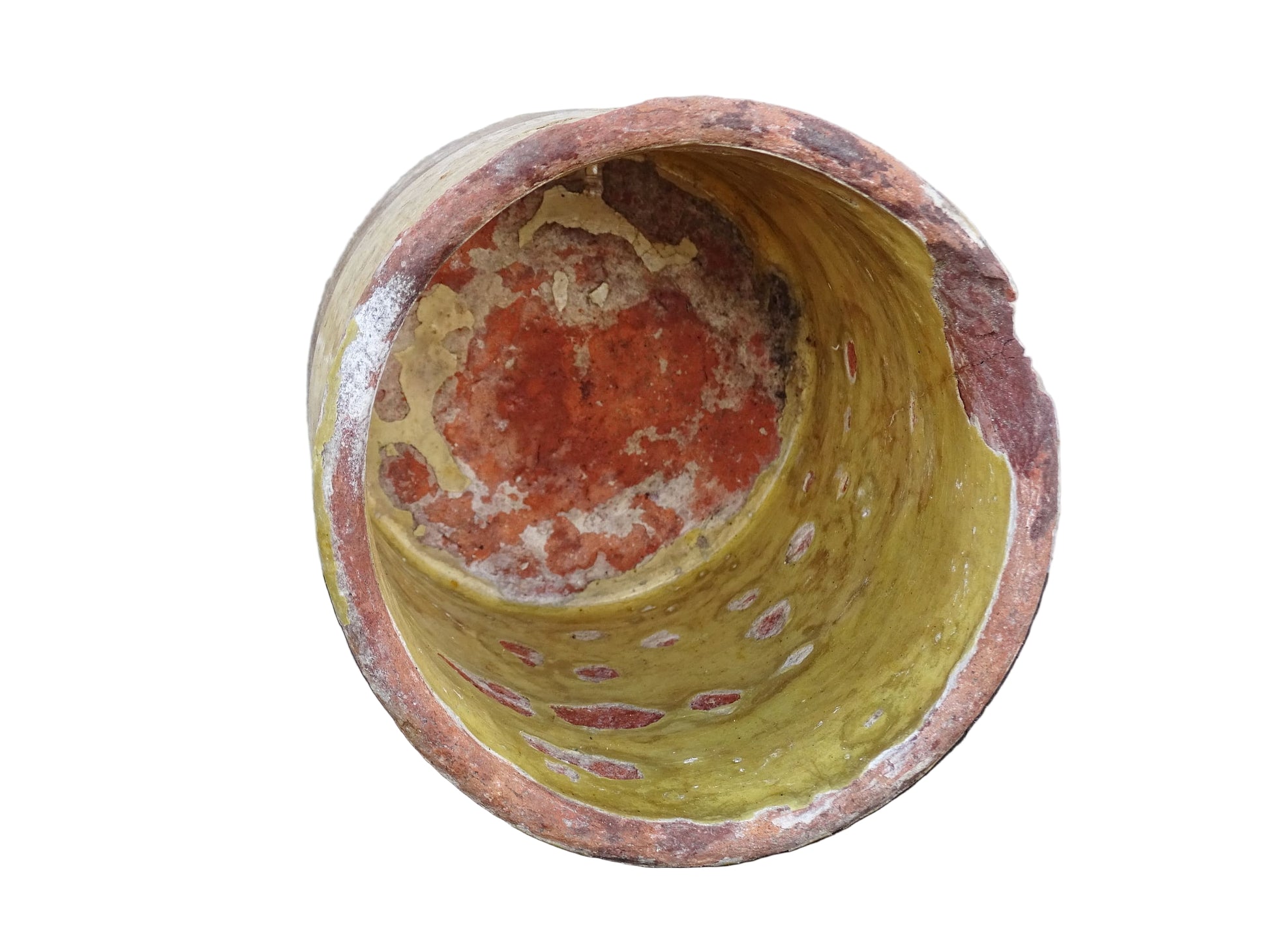 French antique yellow confit pot with patina. Aged earthenware pot with glaze.