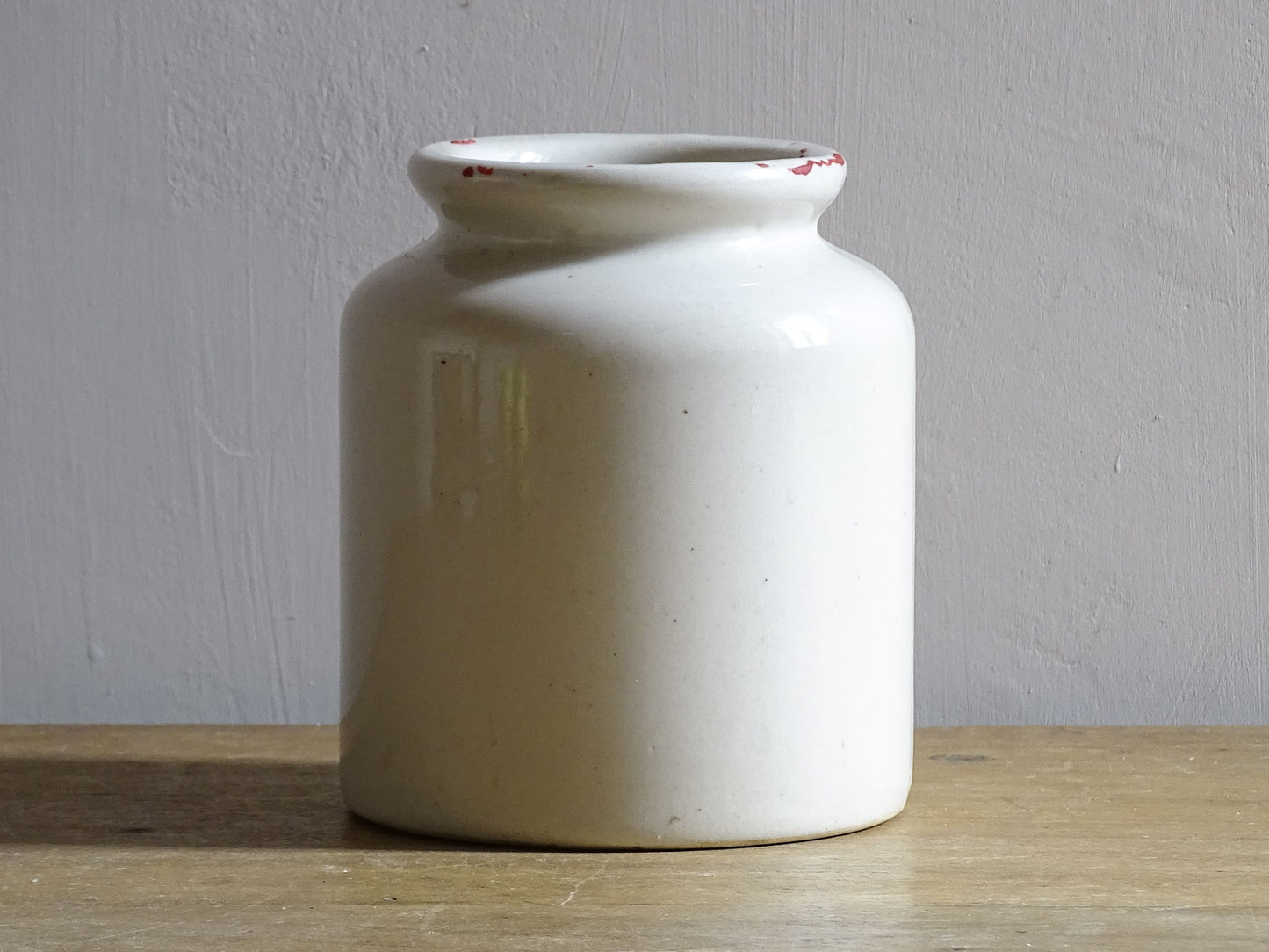 Small French vintage ceramic jar or stoneware mustard pot with a pale cream glaze.