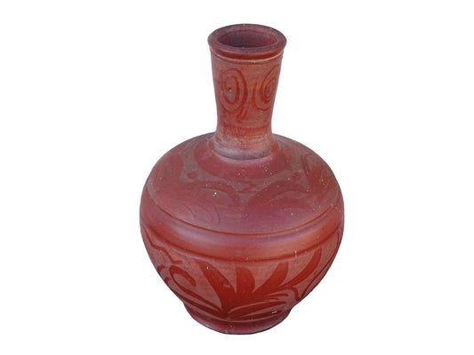French vintage pottery vase in a deep red colour with floral detailing. The body of this terracotta vessel is bulbous in shape