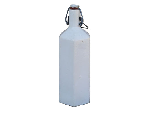 French vintage stoneware bottle with a white glaze and hexagonal in shape.