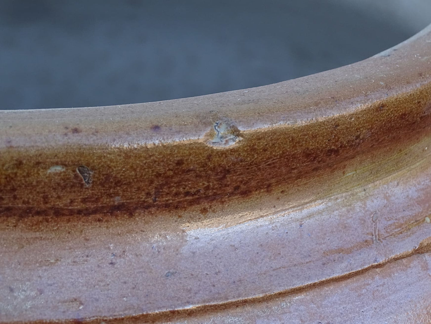 French antique ceramic jar with salt glaze. Brown confit pot with two handles and grey glaze interior.