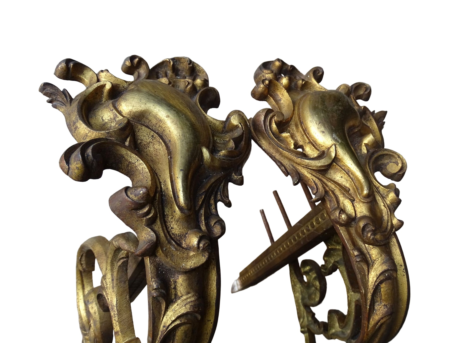 French antique ormolu curtain rod holders. Highly decorative gilt bronze curtain pole brackets.