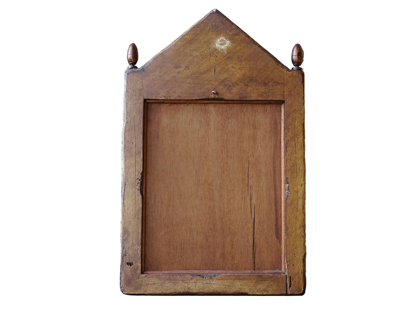 French antique wooden mirror topped with a triangular pediment decorated with a fleur de lis and two turned finial