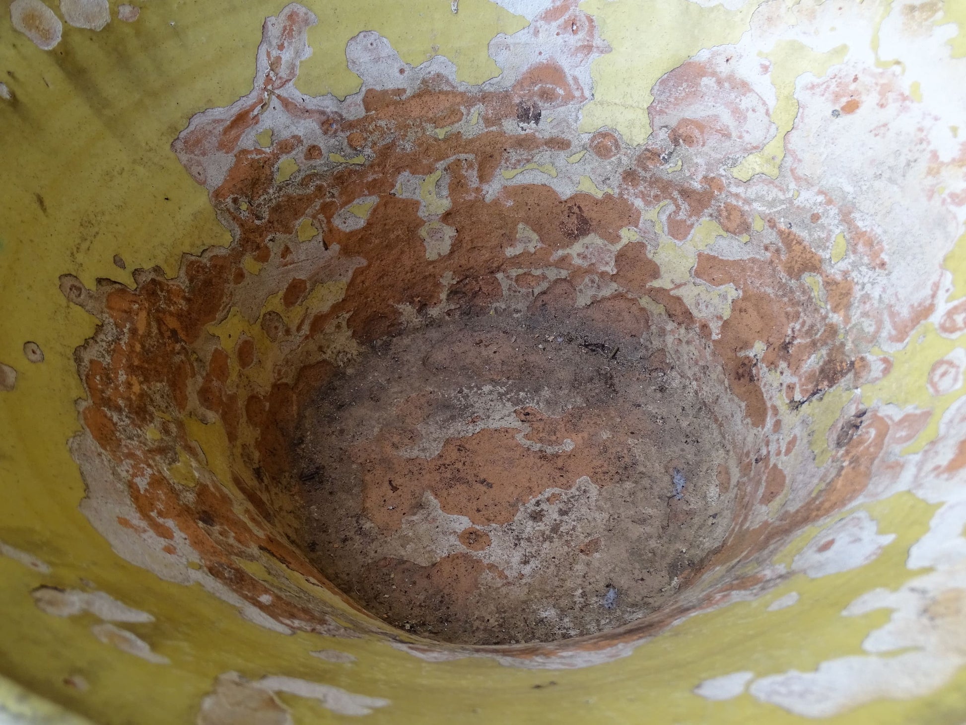 French antique tian bowl with a yellow glazed interior. Old terracotta confit bowl from the 19th century.