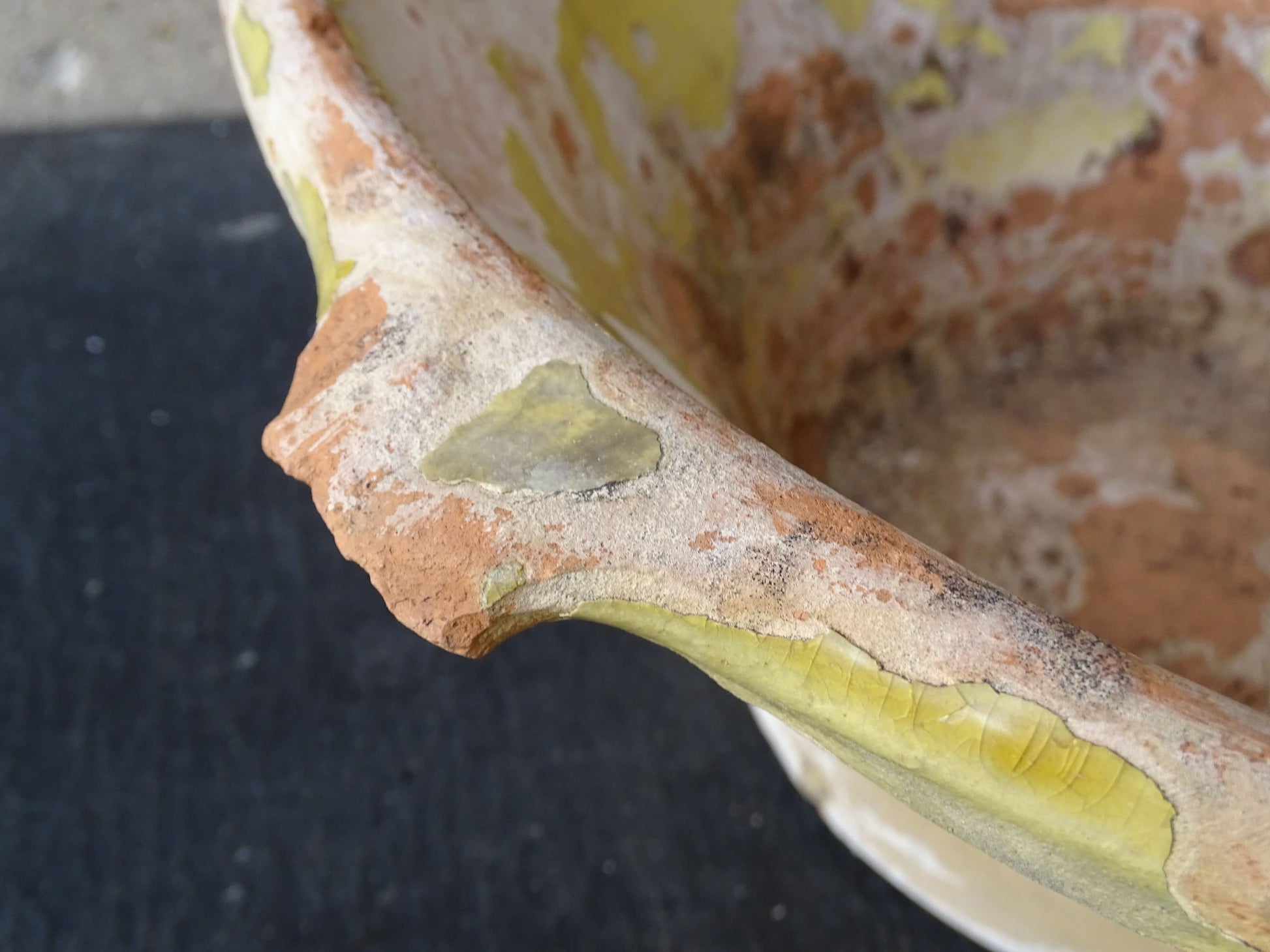 French antique tian bowl with a yellow glazed interior. Old terracotta confit bowl from the 19th century.