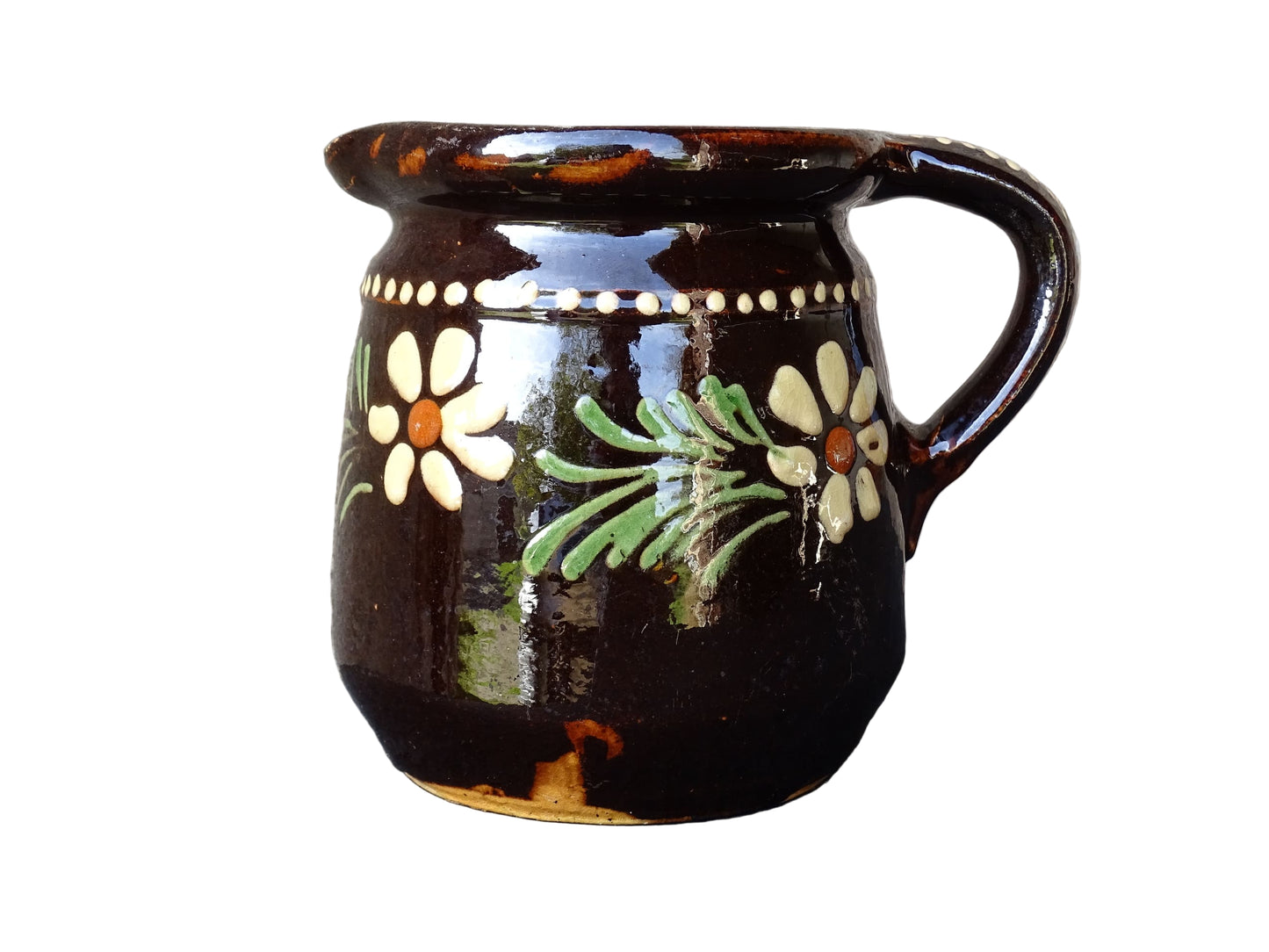 French vintage ceramic pitcher from Alsace. Pottery jug with brown glaze and hand painted with flowers, leaves and dots.