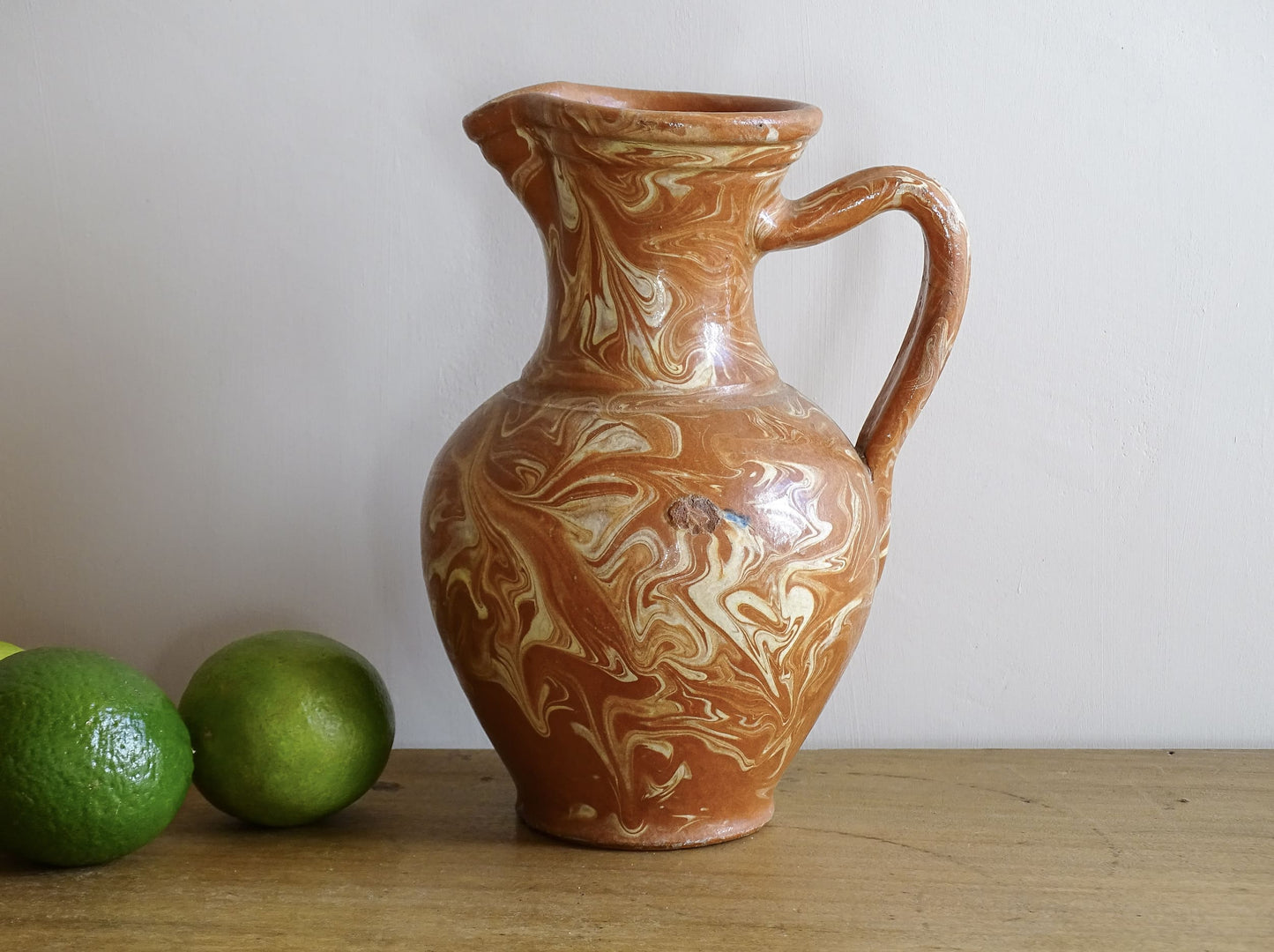 French vintage terracotta pitcher with a marbled glaze. Jaspe glaze ceramic jug.