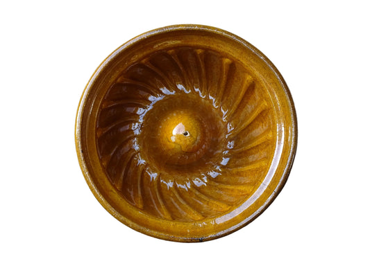 French vintage ceramic mould with a yellow glaze interior and unglazed exterior.