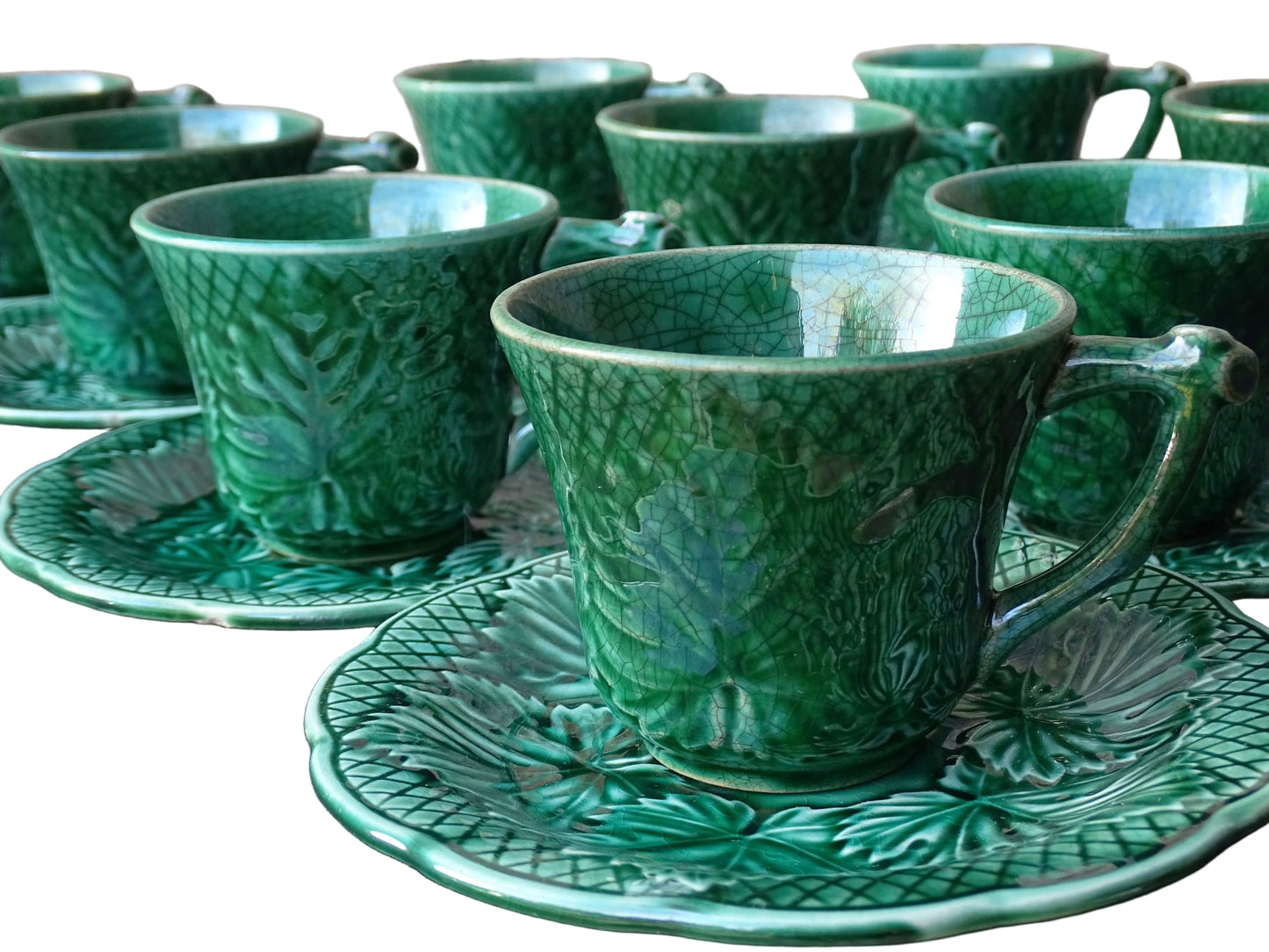 Set of 10 vintage coffee cups by Gien in the Primefleur design. Green glazed ceramic cups and saucers. Barbotine or majolica cups. 