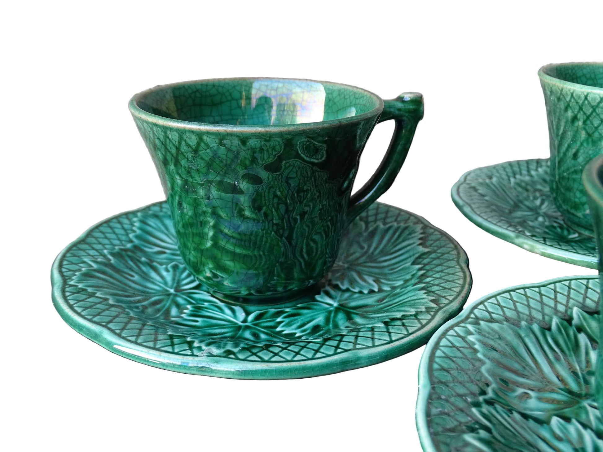 Set of 10 vintage coffee cups by Gien in the Primefleur design with leaf patterns. Green glazed ceramic cups and saucers. Barbotine or majolica cups. 