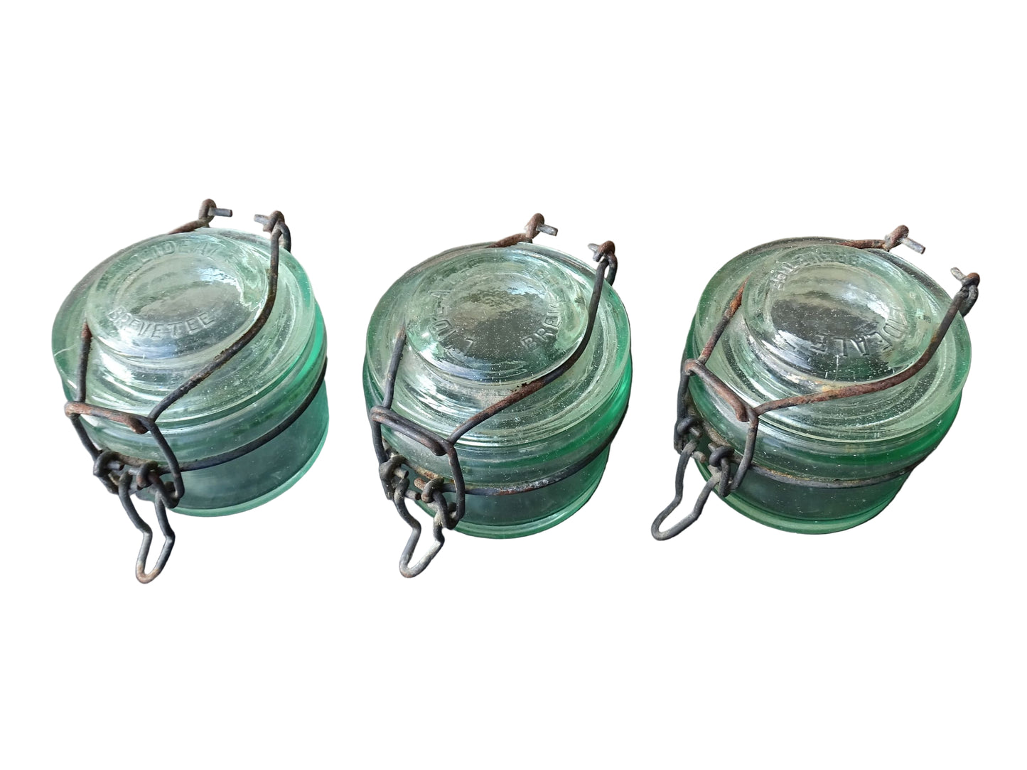 French vintage green glass jars by L'Ideale with metal clasps. Canning or preserving jars with lids. 