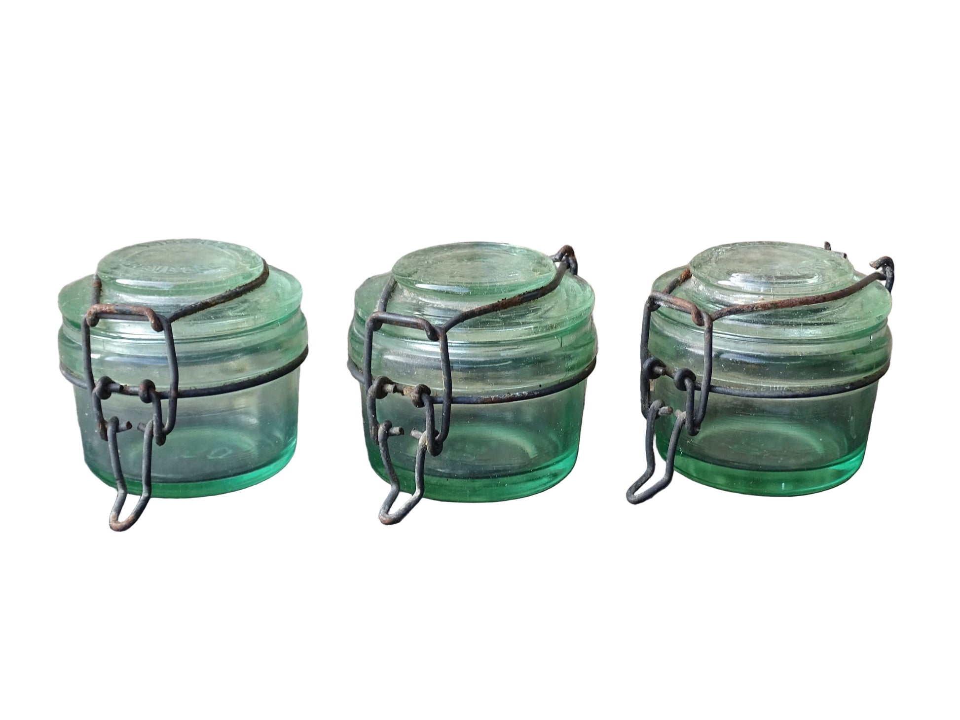 French vintage green glass jars by L'Ideale with metal clasps. Canning or preserving jars with lids. 