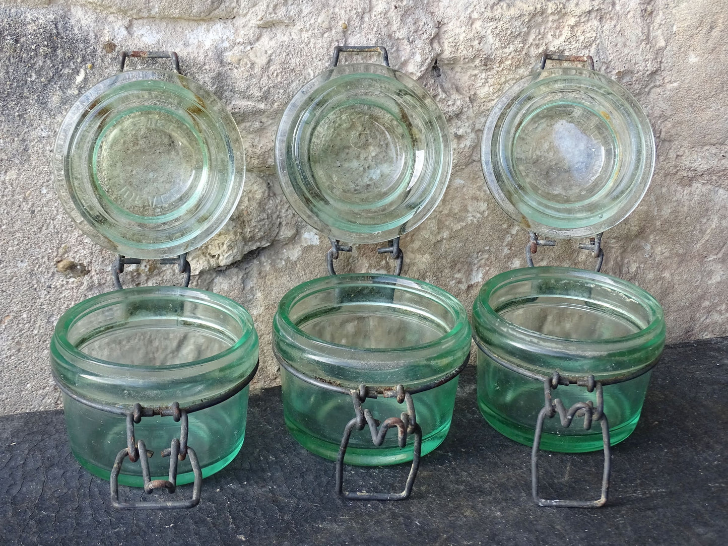 French vintage green glass jars by L'Ideale with metal clasps. Canning or preserving jars with lids. 