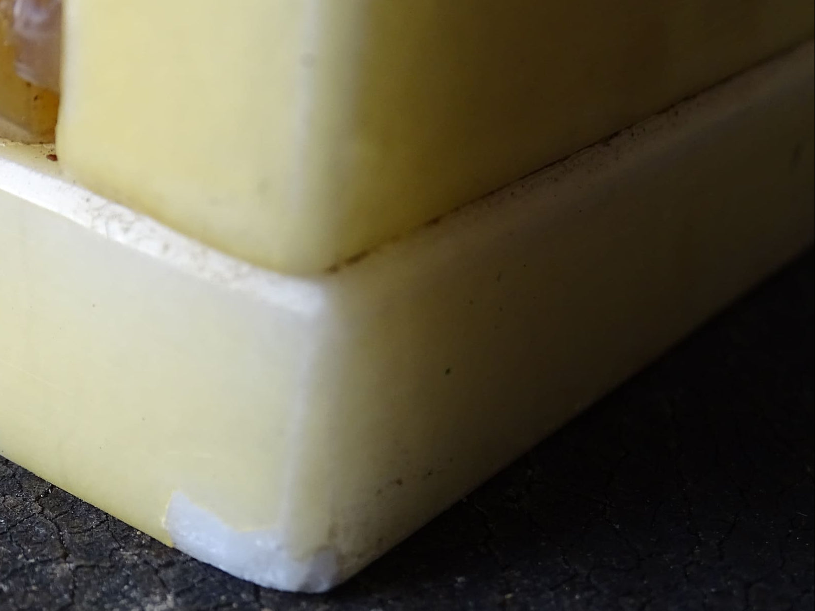 Pair of vintage alabaster bookends with a sculptural look. They have geometric lines with an Art Deco influence. Each bookend has a soft cream alabaster with a warm caramel toned section.