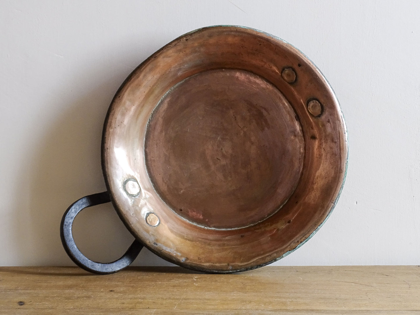 French antique copper pan with a wrought iron handle. 