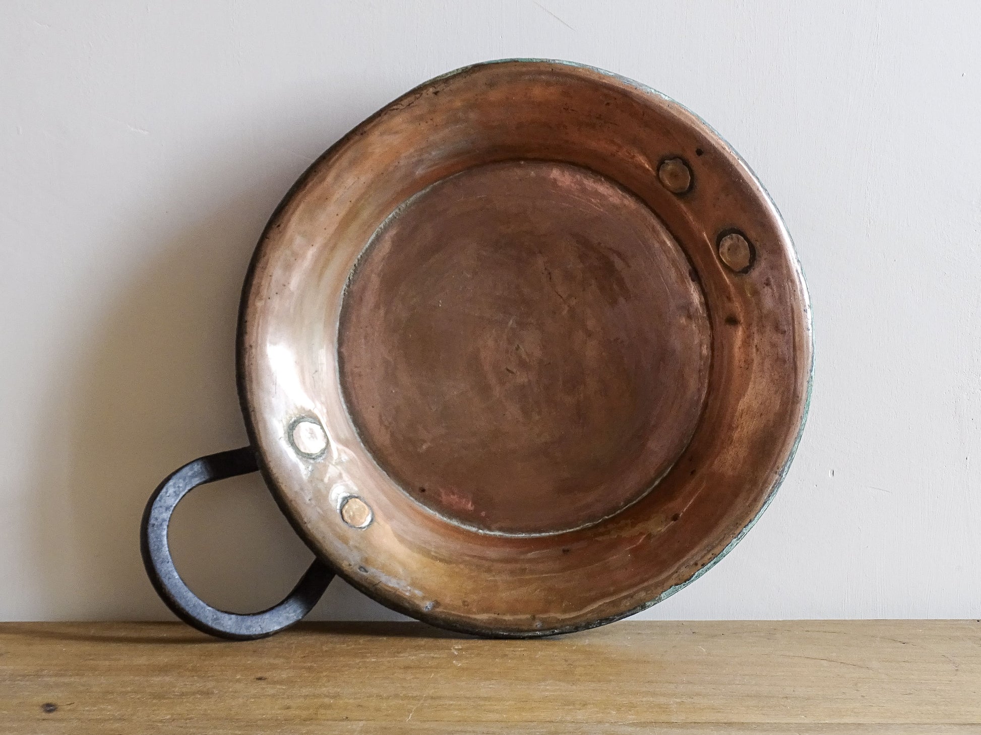 French antique copper pan with a wrought iron handle. 