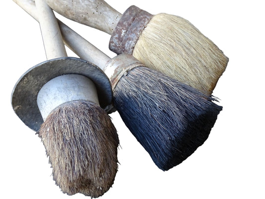Three old French vintage paint brushes with wooden handles and horse hair brushes.