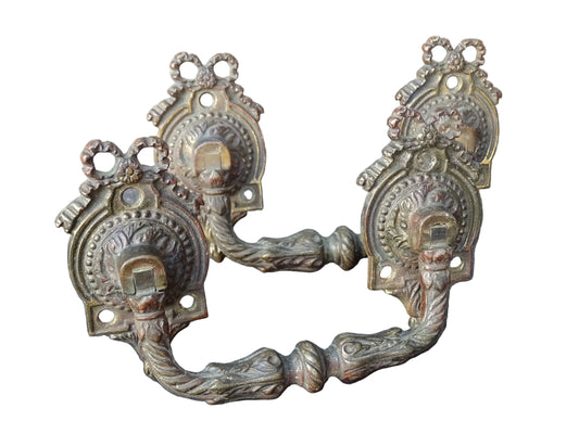 Pair of French antique gilt bronze drawer pulls with ribbon detailing, signed L.Pinet. Nineteenth century ormolu handles. 