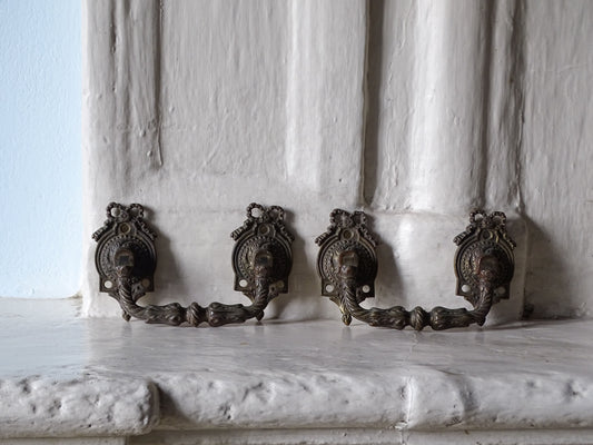 French antique bronze drawer pulls with bow detailing