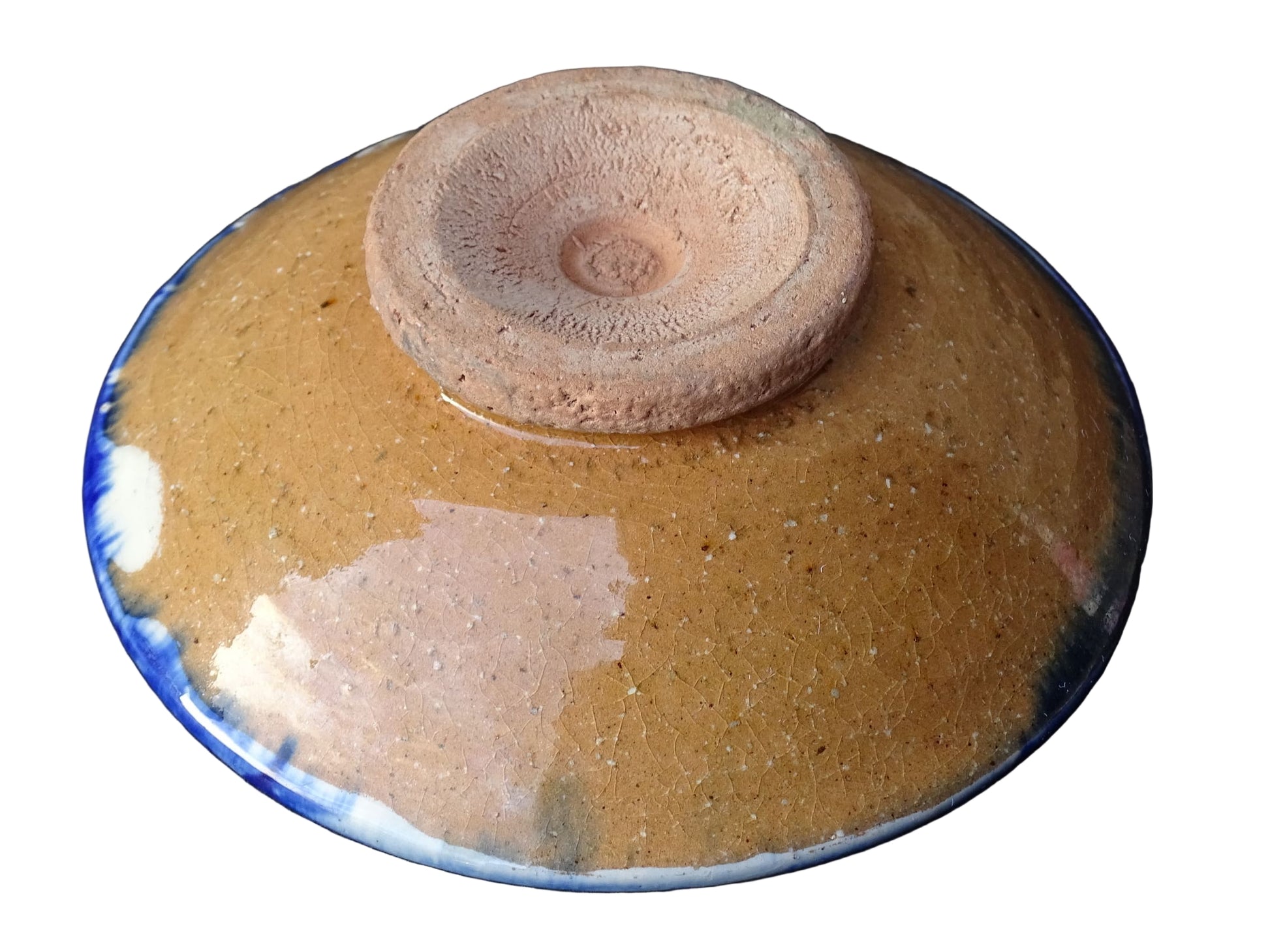 Small vintage ceramic dish with a blue glaze pattern with flecks of red. Moroccan earthenware dish with a hand-painted design.