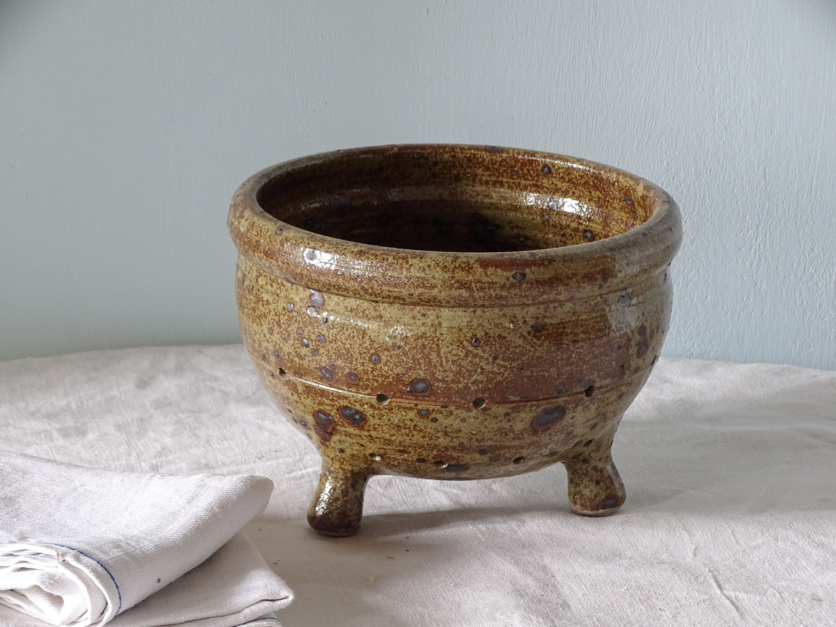 French vintage ceramic colander with brown glaze and three feet