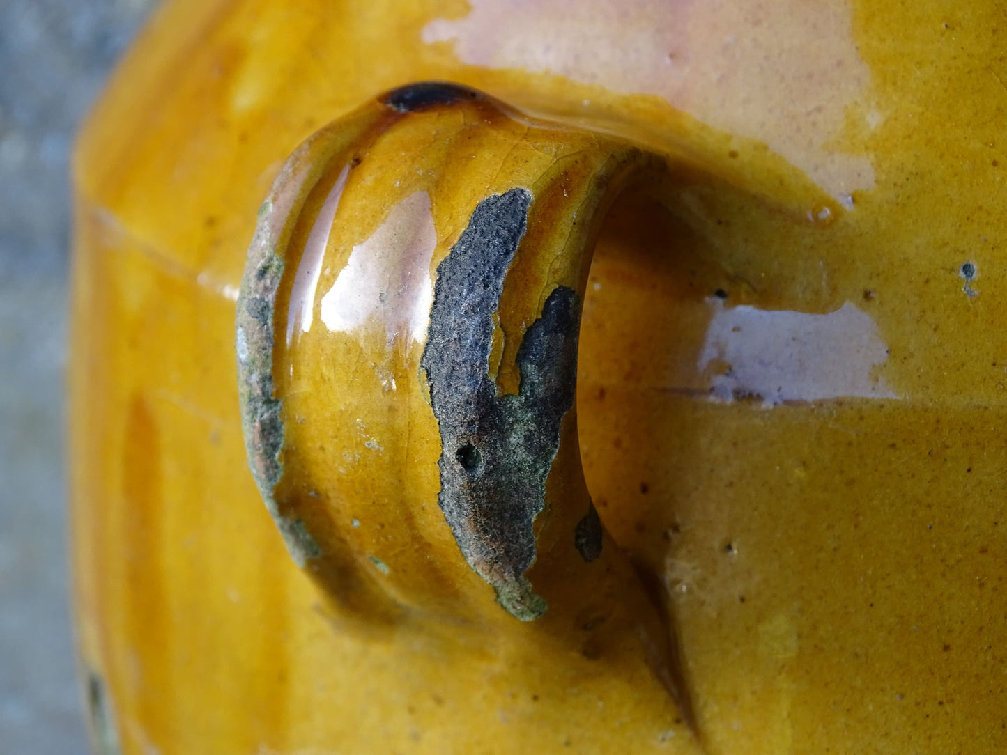 French antique confit pot with mustard yellow glaze. Terracotta jar with two handles. 