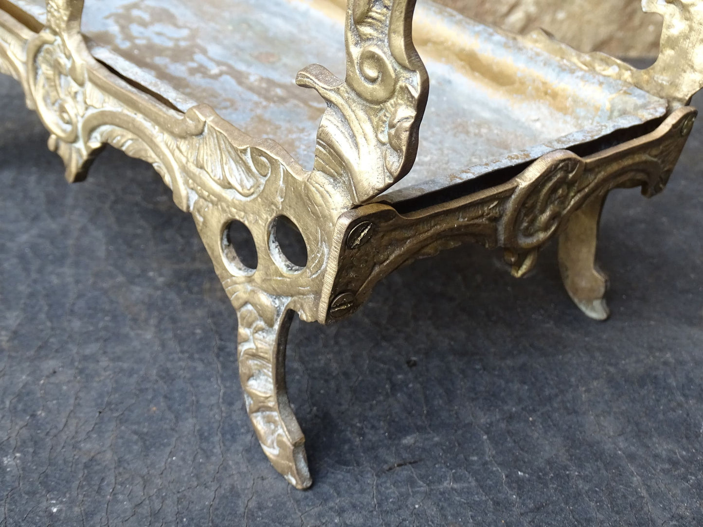 French vintage umbrella stand in gold with flower detailing.
