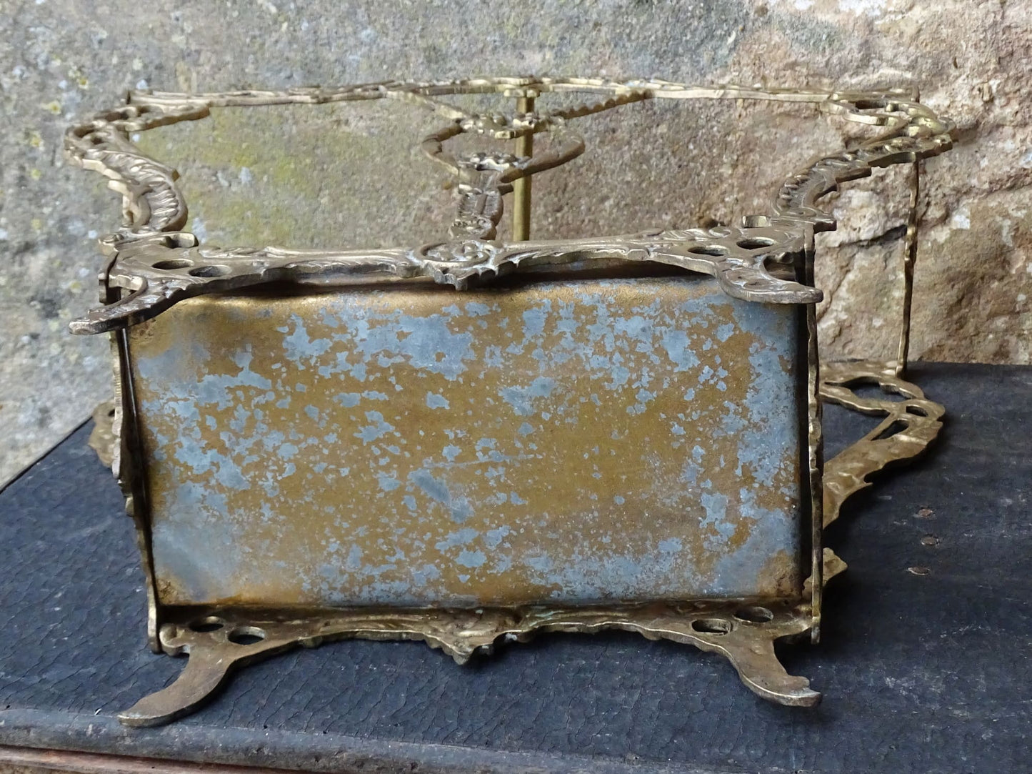French vintage umbrella stand in gold with flower detailing.
