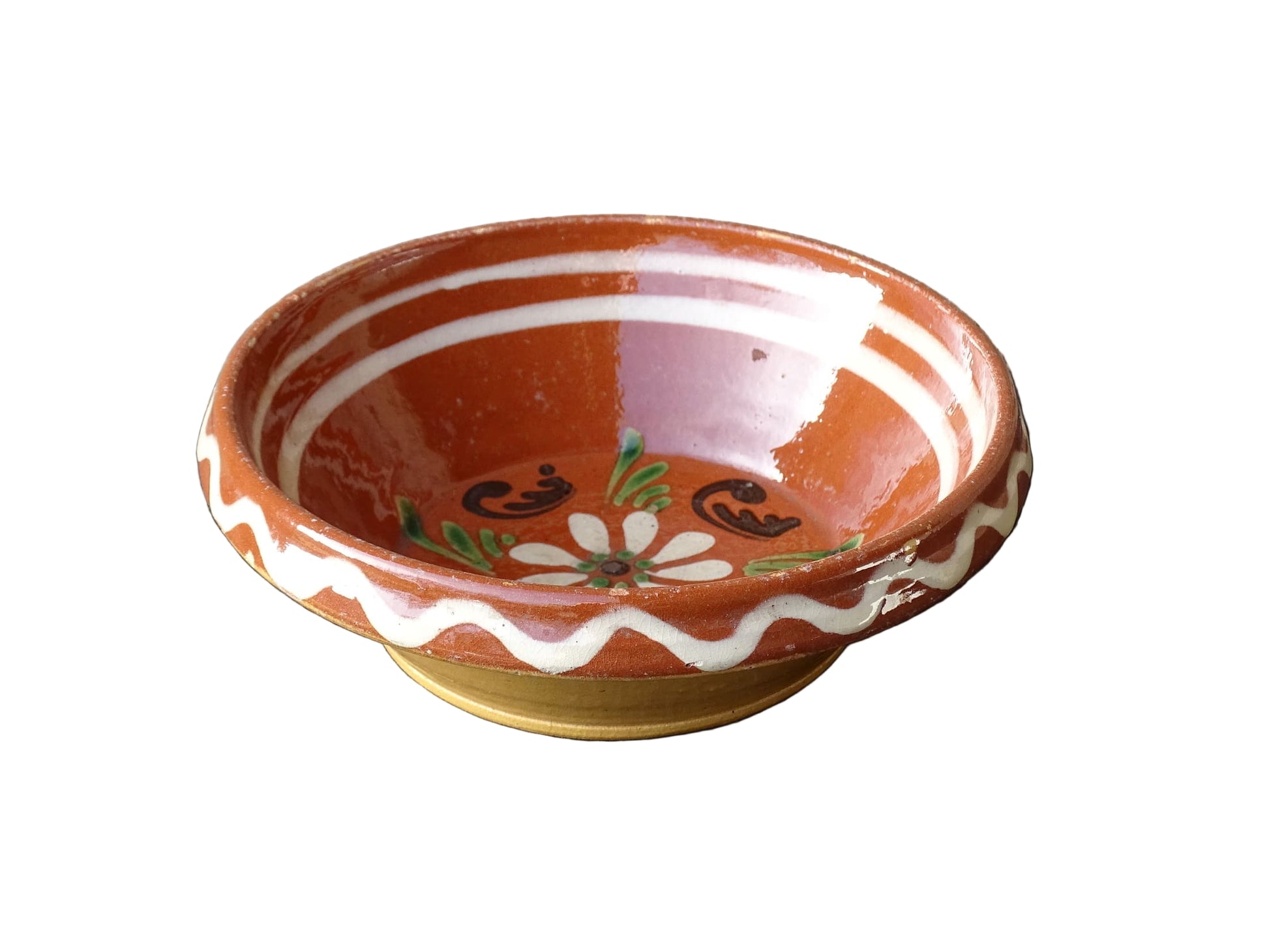 French vintage pottery bowl from Alsace. Glazed terracotta dish with painted flowers.