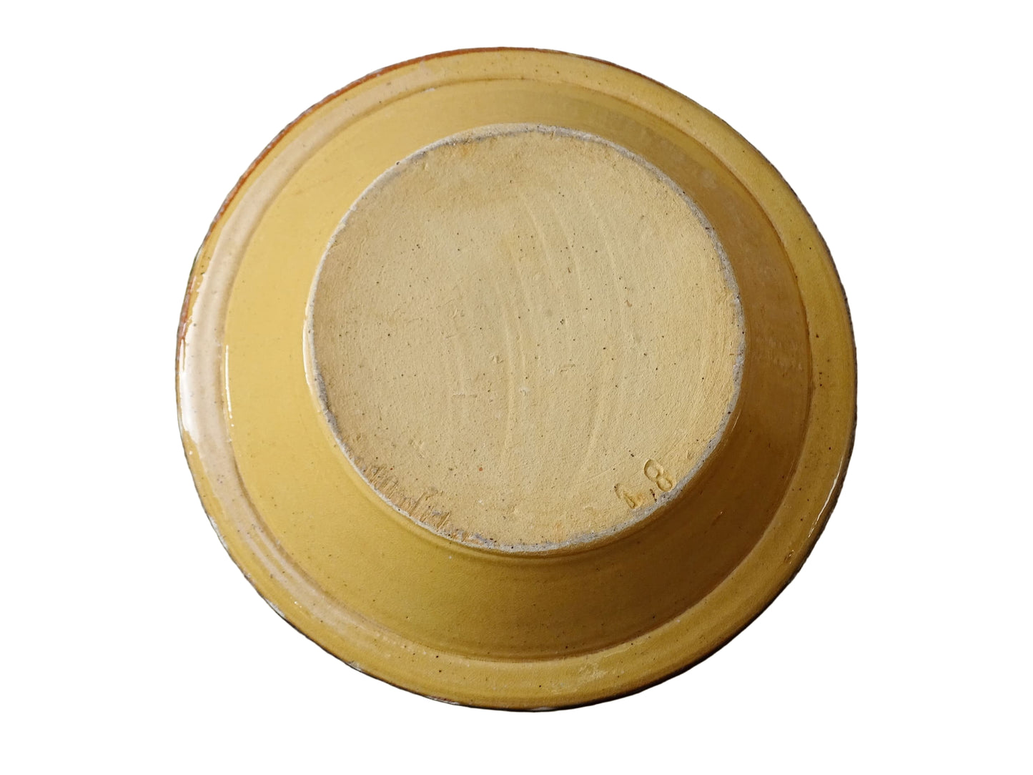 French vintage pottery bowl from Alsace. Glazed terracotta dish with painted flowers.