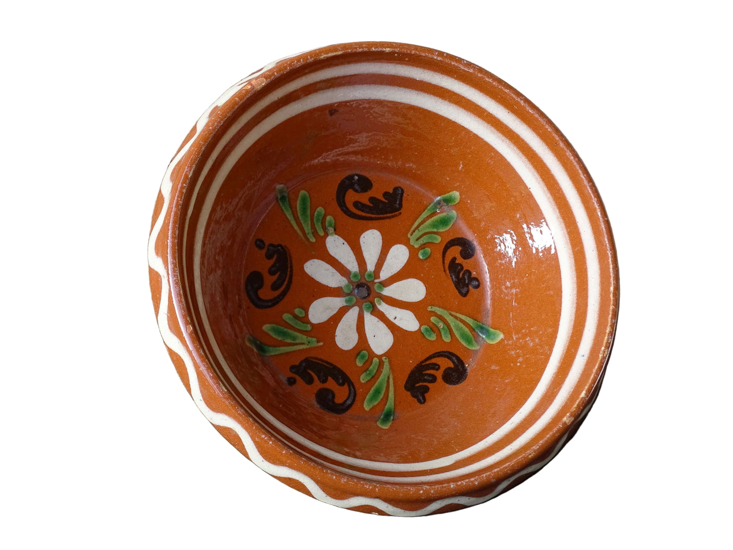 French vintage pottery bowl from Alsace. Glazed terracotta dish with painted flowers.