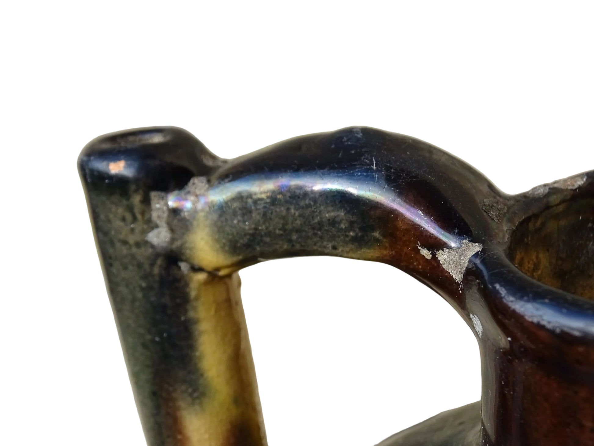 French antique ceramic jug or orjol with striped glaze. Glazed terracotta pitcher with yellow, black and brown glaze. 