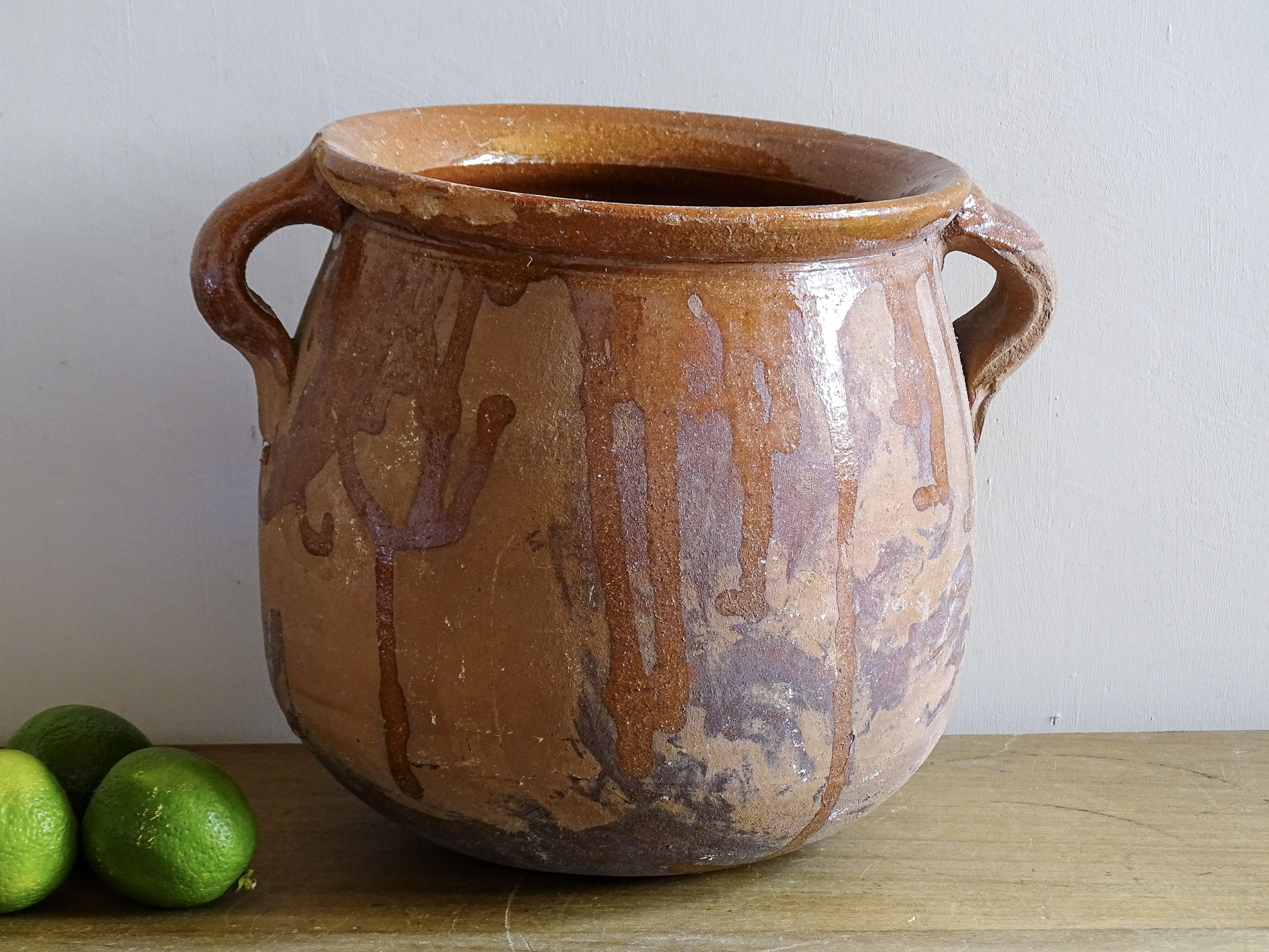 French vintage terracotta pot with an orange glaze