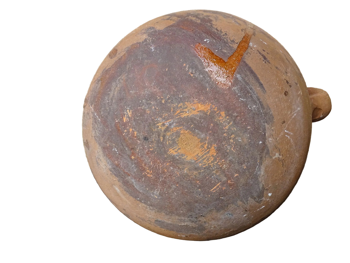 French vintage terracotta pot with orange glaze interior and drip glaze around the sides. Earthenware confit jar with two handles and a curved base.
