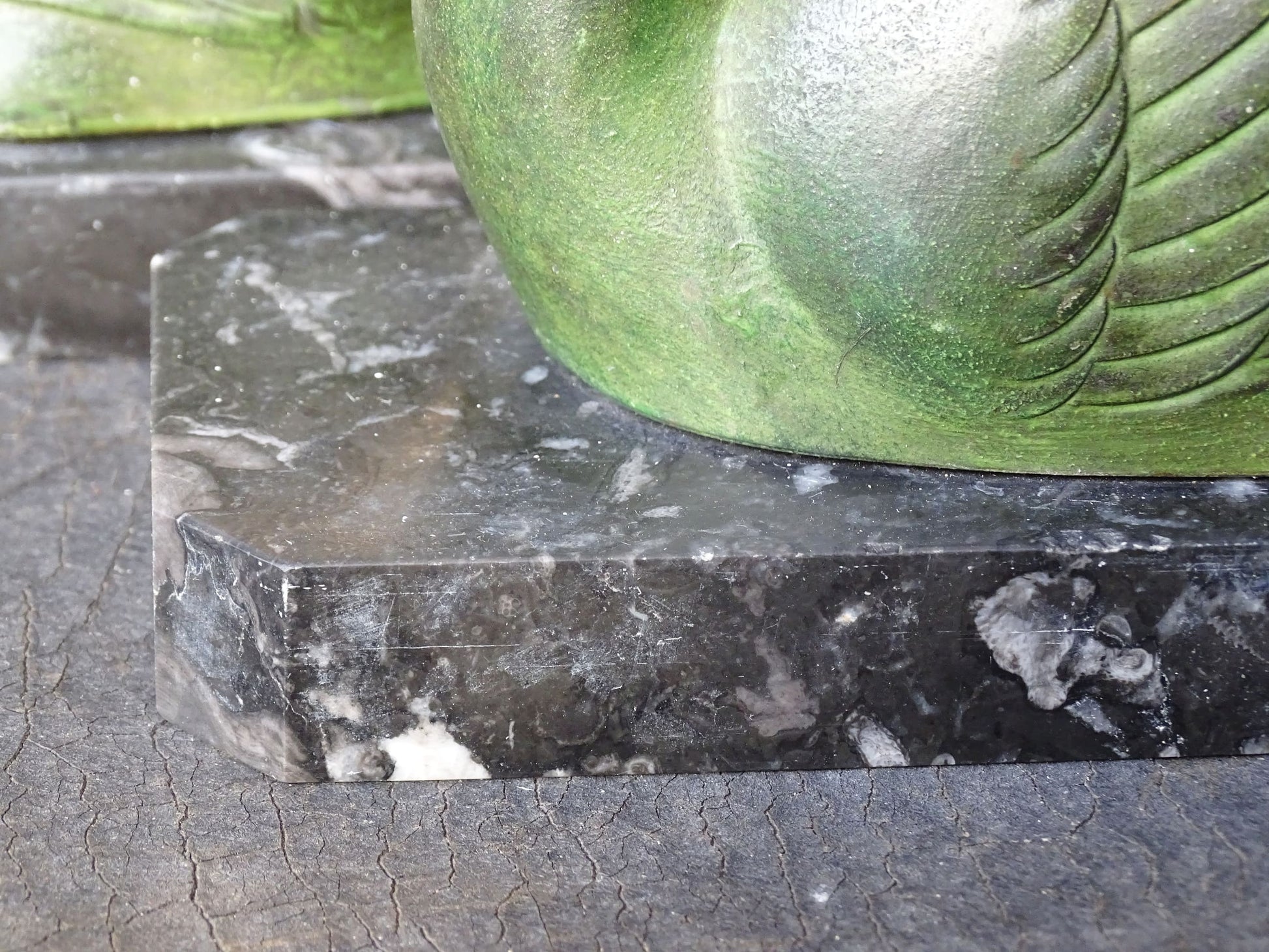 French vintage swan books on black marble bases. The swan statues have a green verdigris effect. 