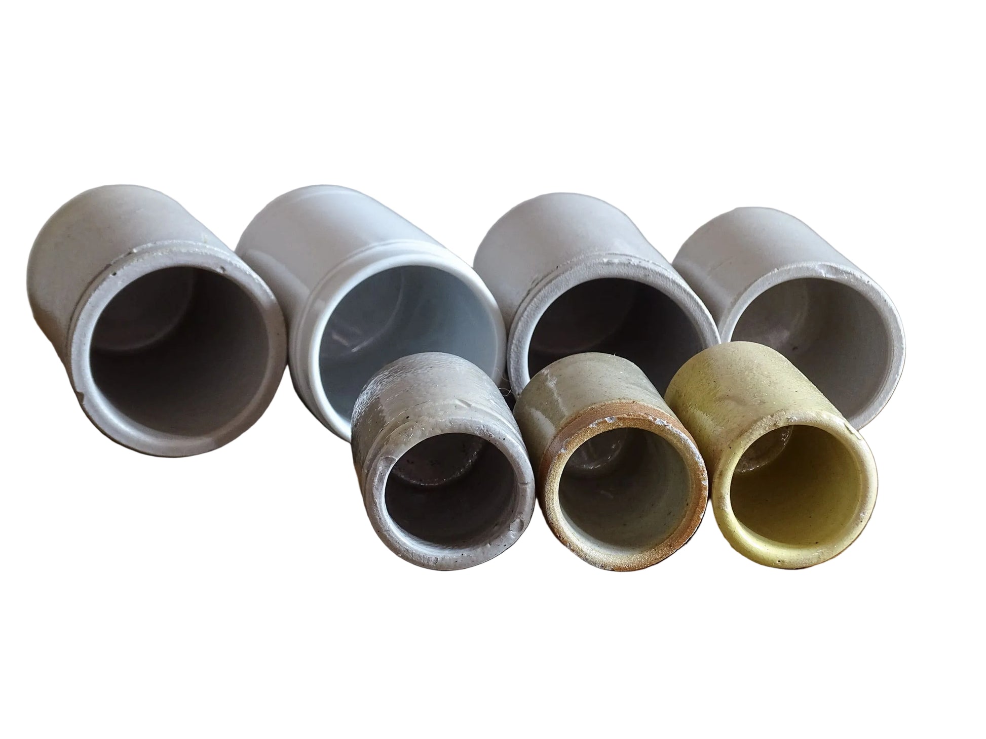 A set of seven small French vintage stoneware pots. This collection of pottery jars would look amazing as part of a rustic French farmhouse style home. Display in your kitchen as part of your shelf decor.