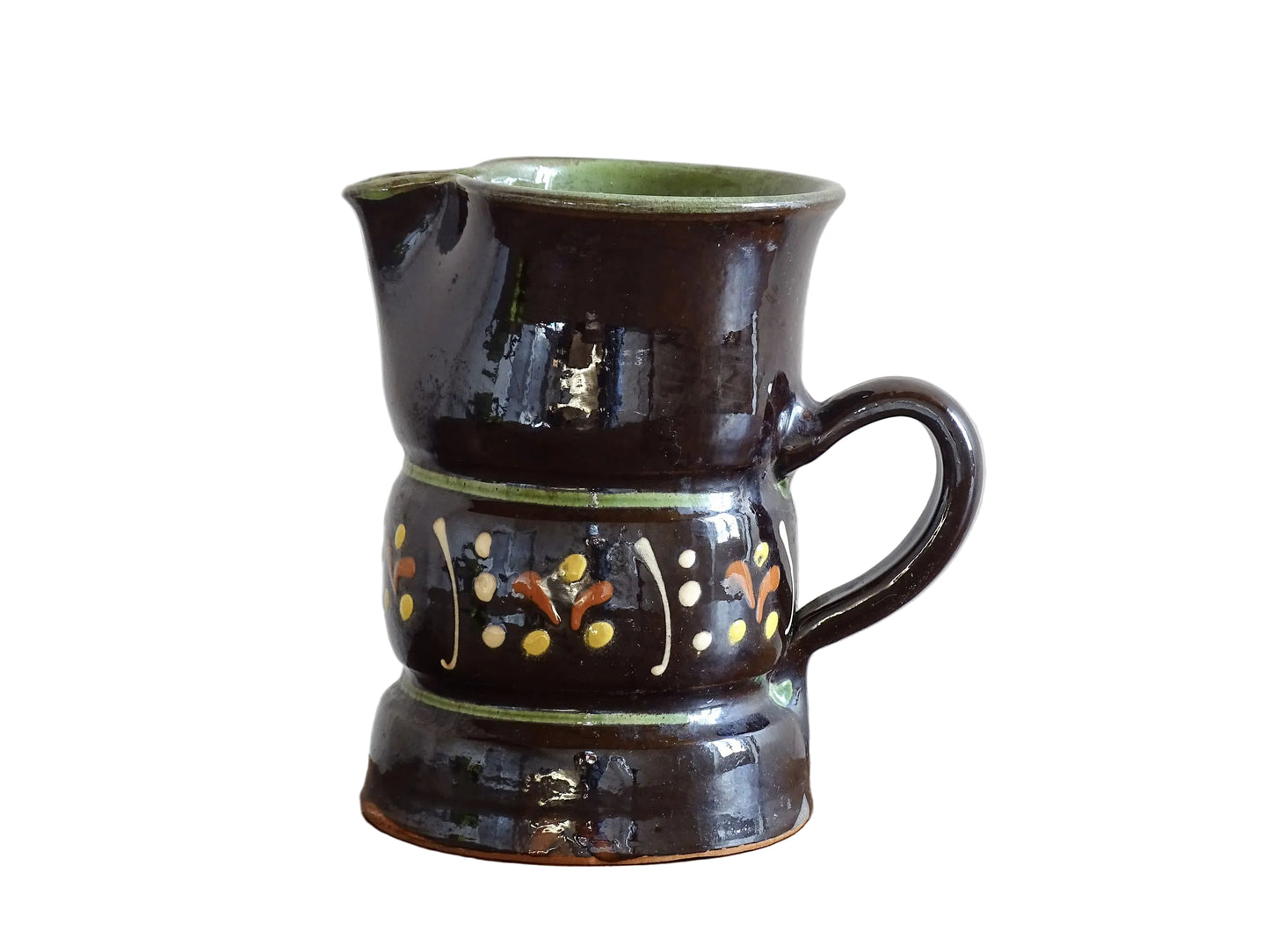 Beautifully rustic French vintage ceramic jug. It has a deep brown glaze and hand-painted decoration . This pottery jug is from Alsace.