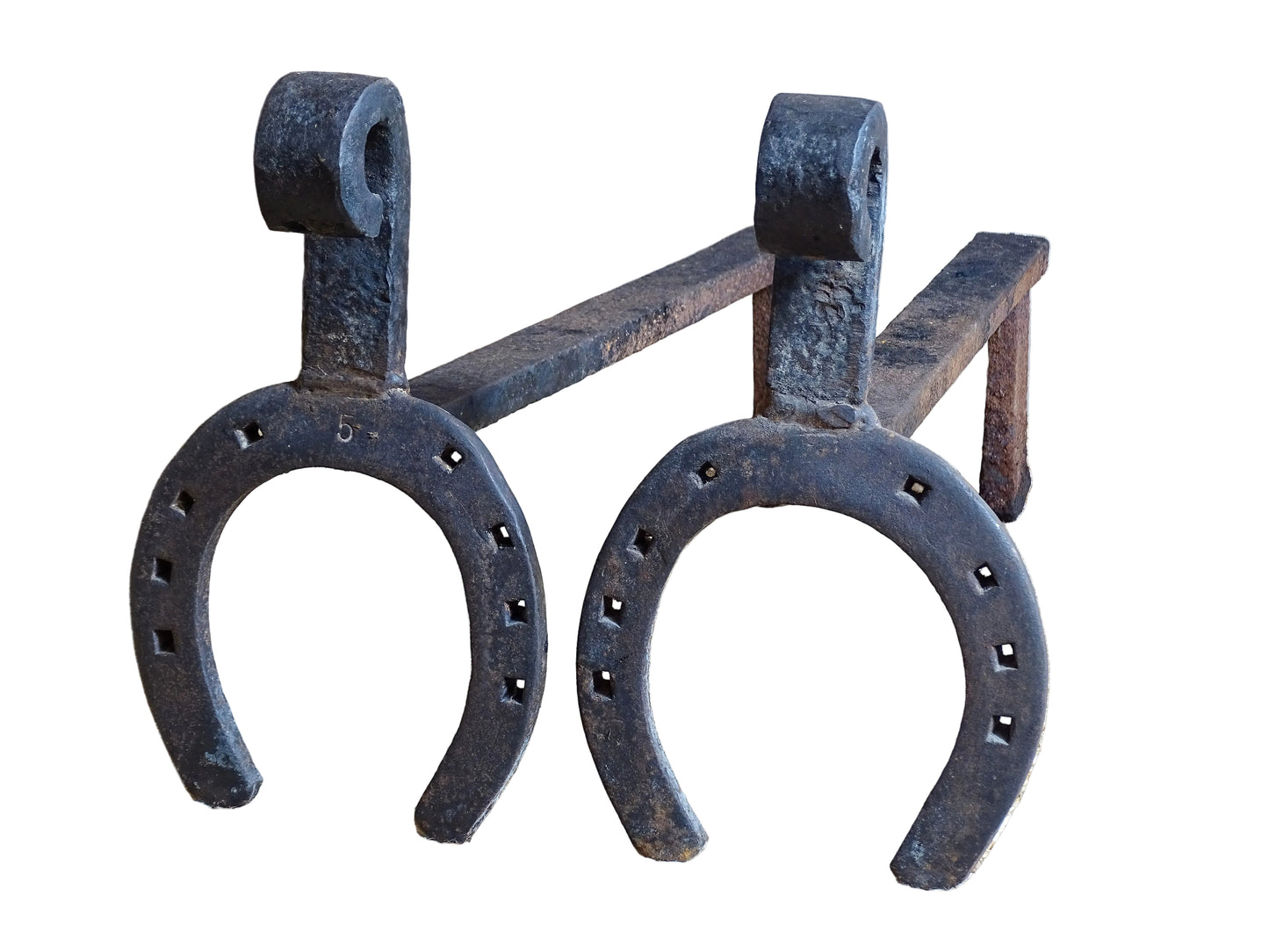  pair of French antique wrought iron andirons or fire dogs, date to the 19th century. They incorporate hand-forged horseshoes, with square-punched nail holes and substantial rear supports. A rustic, agricultural design with authentic forge marks throughout.