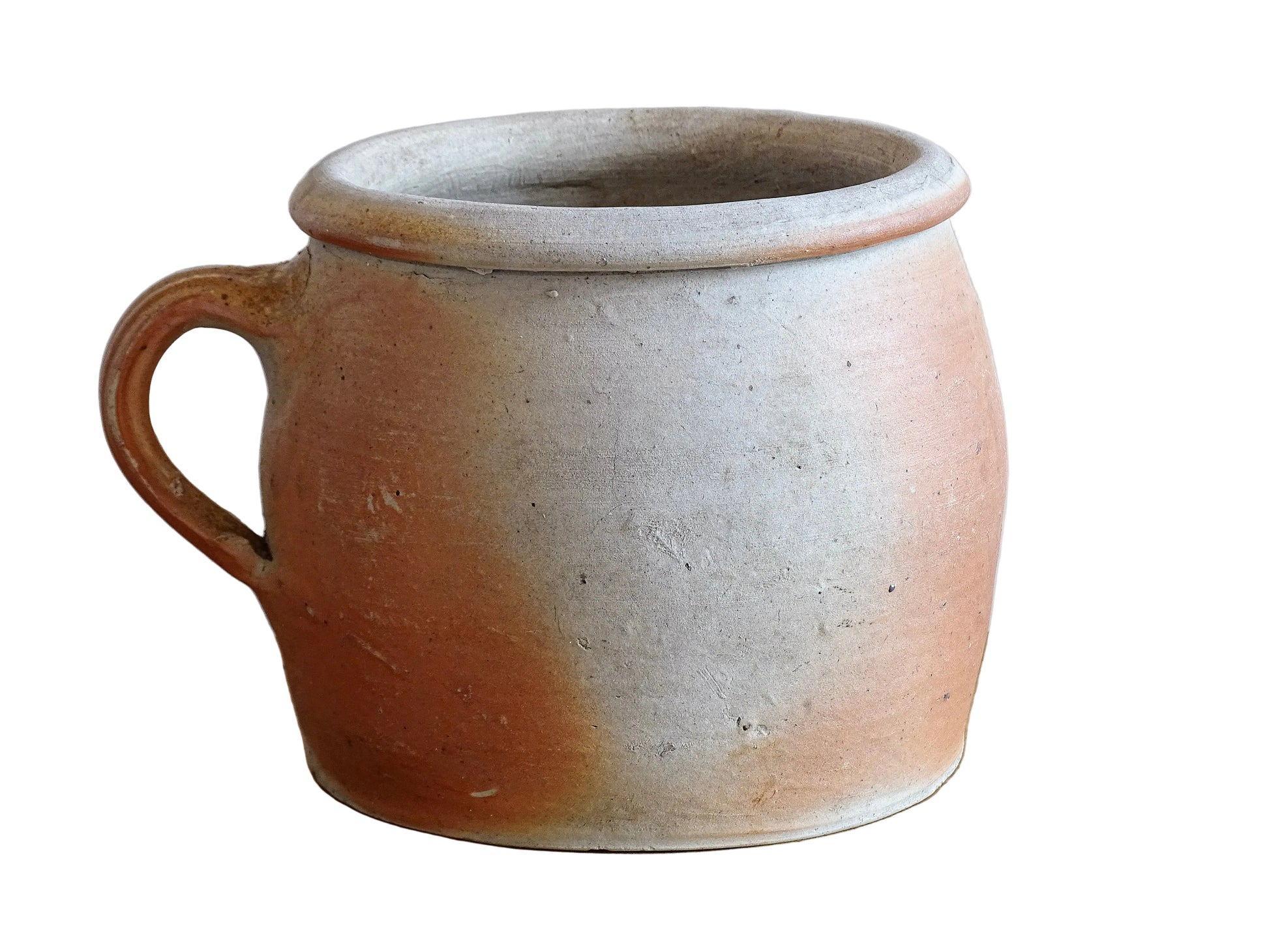 French antique stoneware jar with handle . This old confit pot with the colours of warm terracotta to pale hues is unglazed. It dates to the early 20th century. 