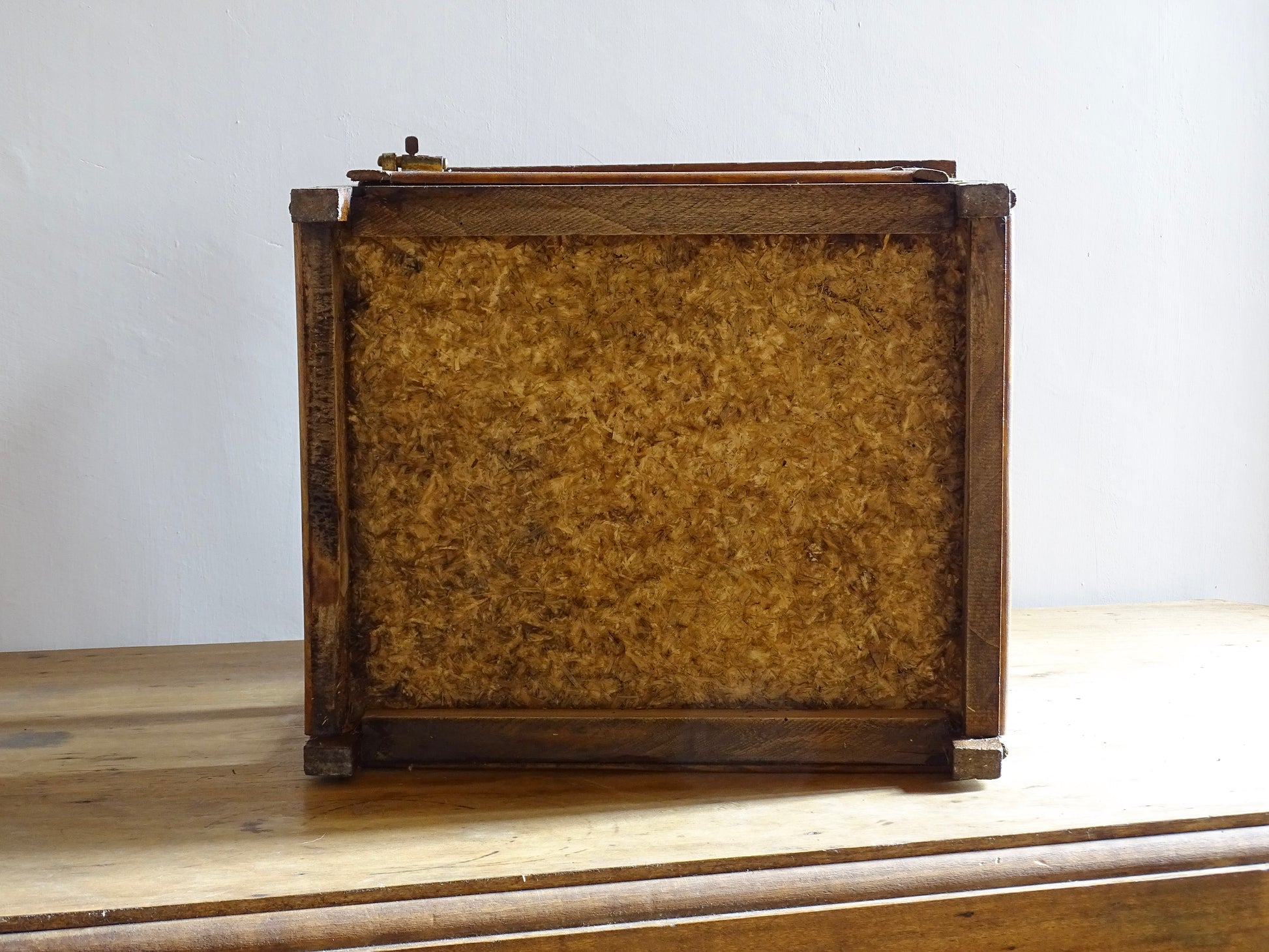 A French antique garde manger or countertop pantry cabinet. Circa 1920. This antique wooden garde manger with wire mesh panels on all sides was traditionally used for storing cheese, fruit, and baked goods while allowing air to circulate.