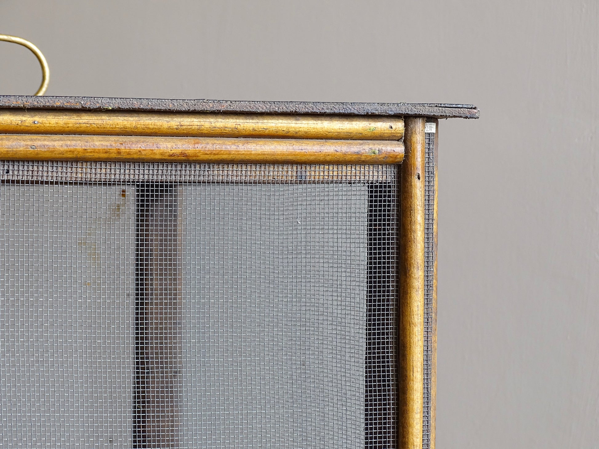 A French antique garde manger or countertop pantry cabinet. Circa 1920. This antique wooden garde manger with wire mesh panels on all sides was traditionally used for storing cheese, fruit, and baked goods while allowing air to circulate.