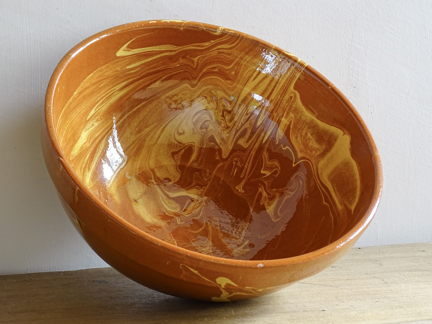 Antique French jaspe glazed pottery bowl with swirling marbled slip decoration