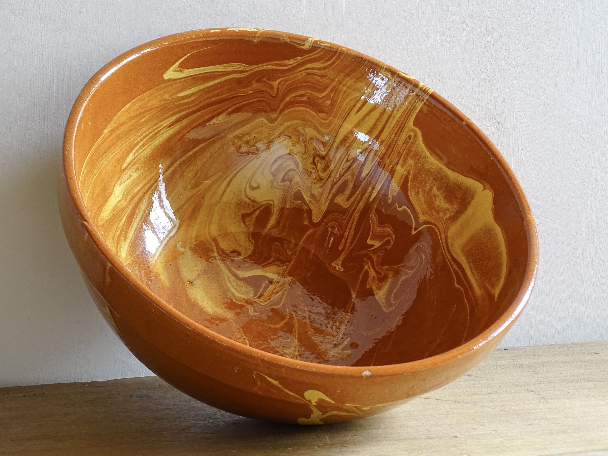 Antique French jaspe glazed pottery bowl with swirling marbled slip decoration