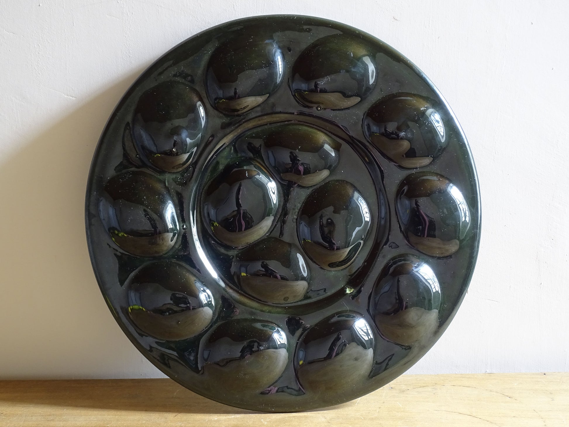 Underside of vintage St Clément French ceramic oyster plate showing maker’s mark.