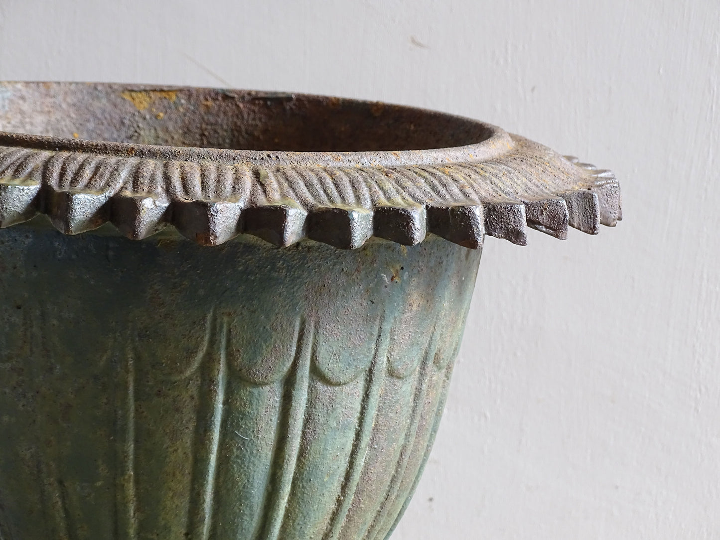 Classical style cast iron urn with fluted decoration